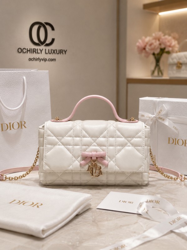 Miss Dior white-spun pink handle bow bag