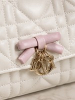Miss Dior white-spun pink handle bow bag